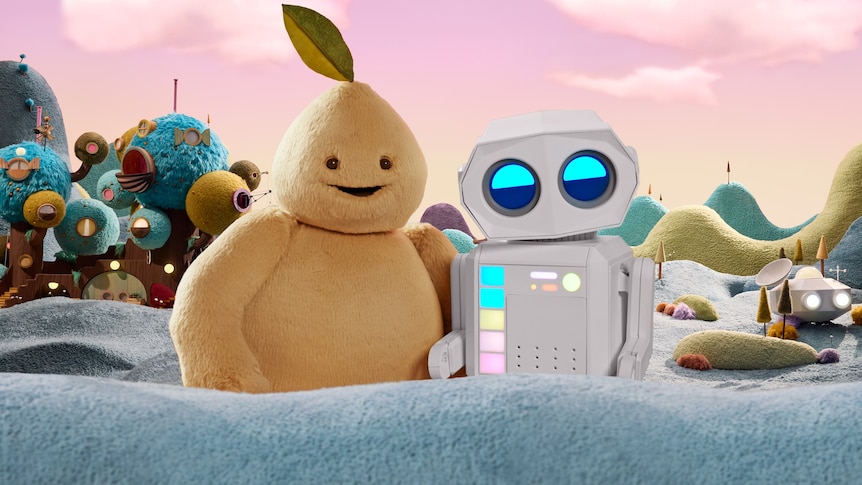A yellow creature with a smiling face and a leaf on its head standing next to a robot with large round eyes