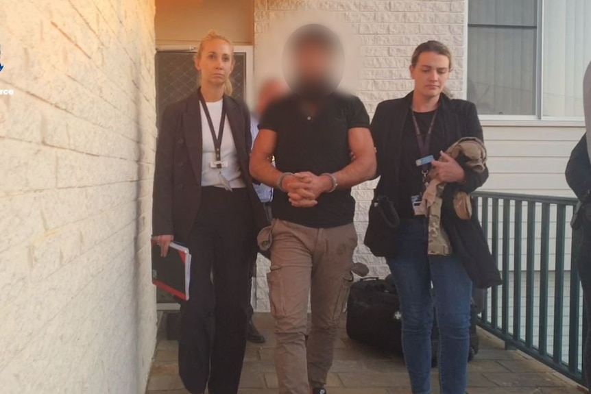 A blurred image of a man charged with sexual offences in Port Macquarie