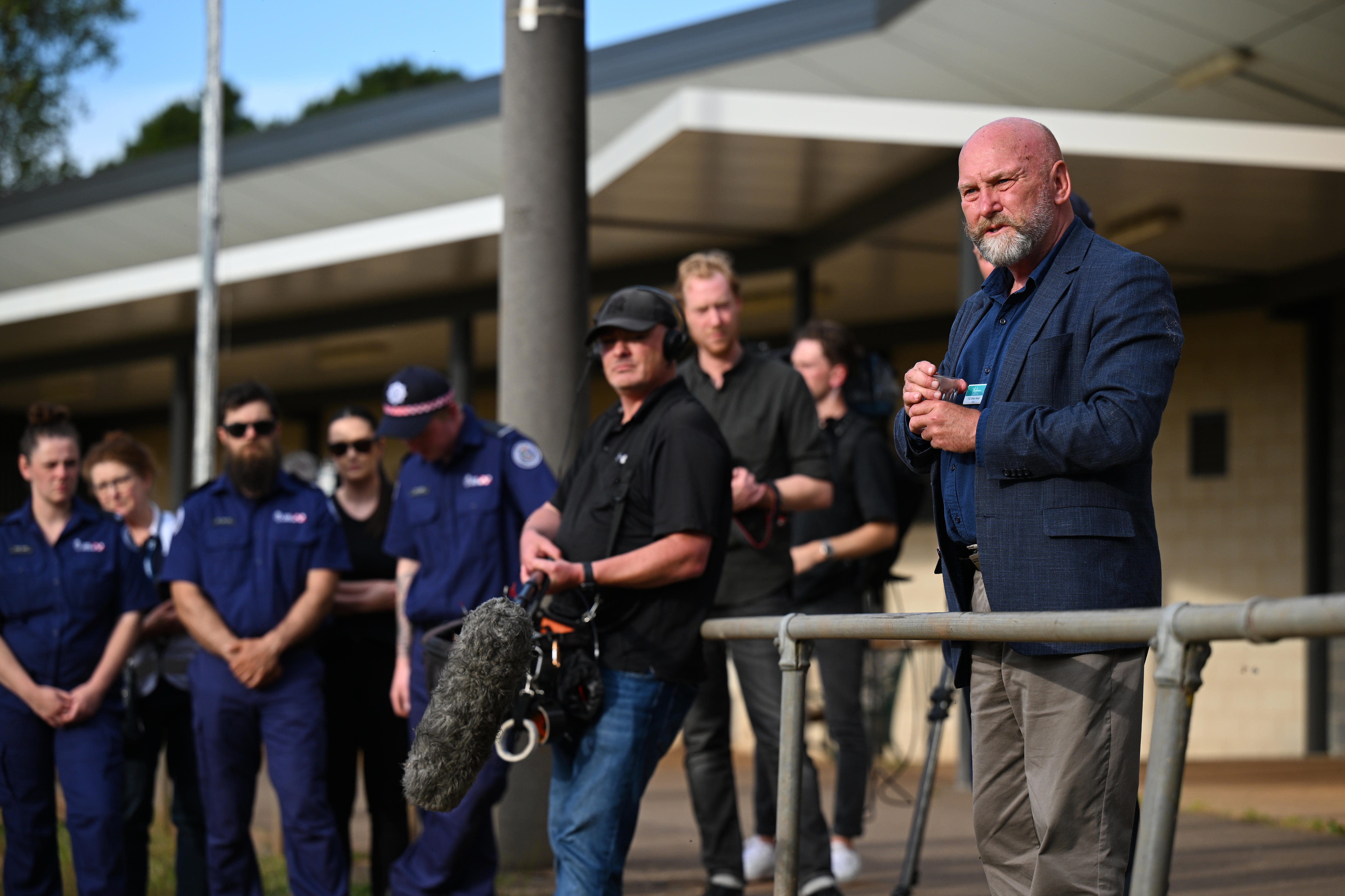 Hepburn Shire council mayor Brian Hood speaking to mourners at a vigil.