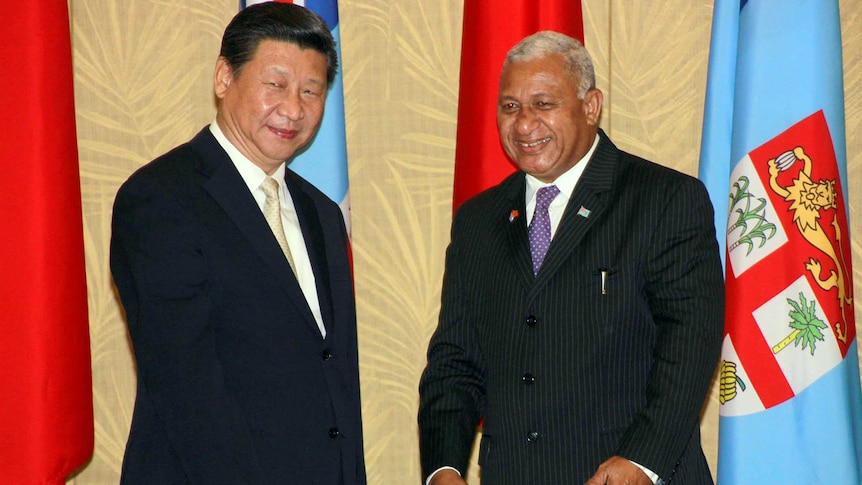 China's president Xi Jinping meets Fiji's prime minister Frank Bainimarama in Fiji