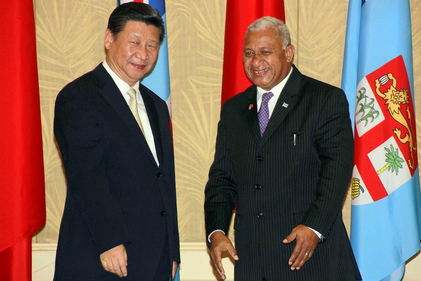 China's president Xi Jinping meets Fiji's prime minister Frank Bainimarama in Fiji