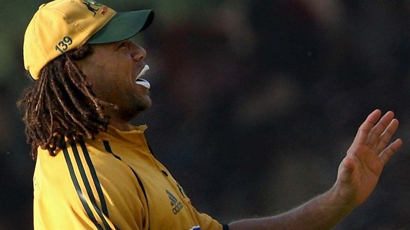 Andrew Symonds looks on in the field