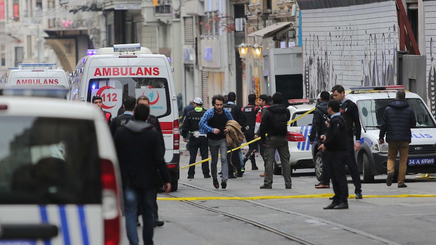 Police secure the area following a suicide bombing Istanbul