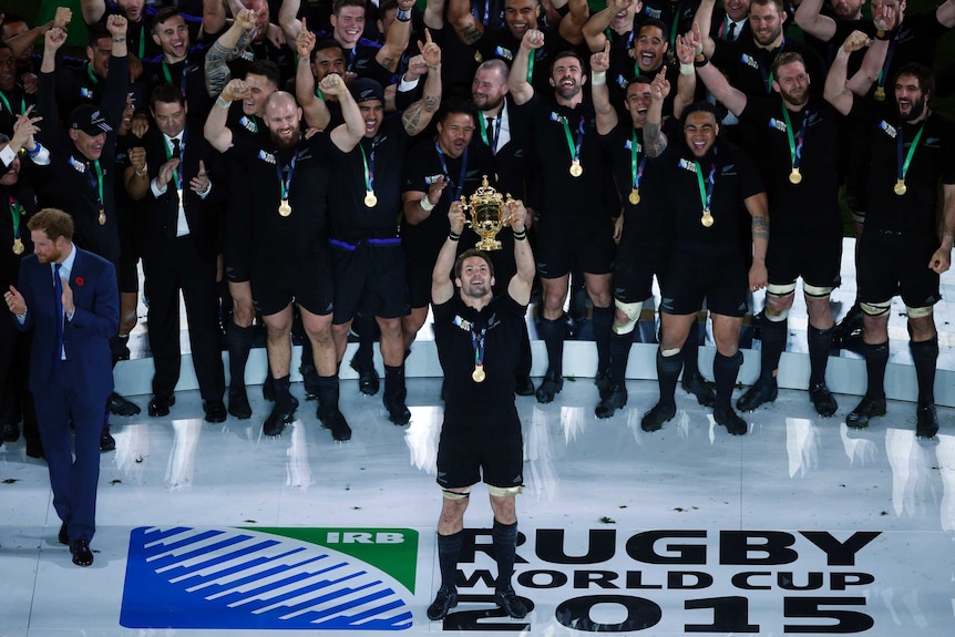 Richie McCaw and the All Blacks celebrate winning the 2015 Rugby World Cup