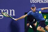 Alex de Minaur stretches for a forehand against Marin Cilic at the US Open.