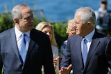 Benjamin Netanyahu and Malcolm Turnbull talk as they walk across the Admiralty House lawn in Sydney.