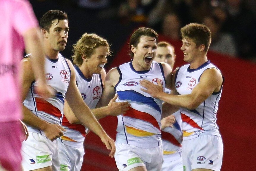 Adelaide Crows and Patrick Dangerfield celebrate his goal against Essendon in round 20, 2015.