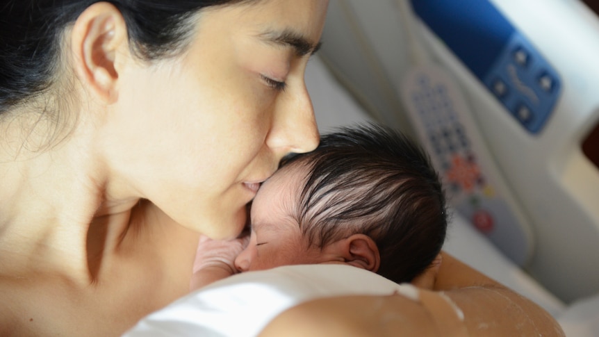 Mother and newborn baby in hospital