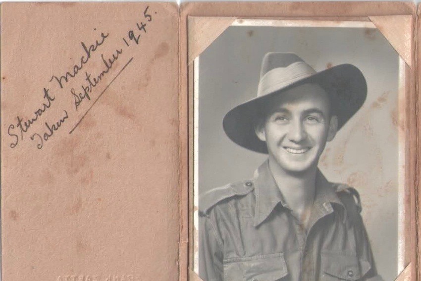 a scan of a black and white service photo with a handwritten note on it that says 'stewart mackie taken september 1945'