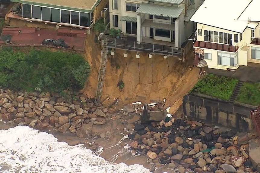 In the NSW town of Wamberal a number of houses are at risk of falling into the sea