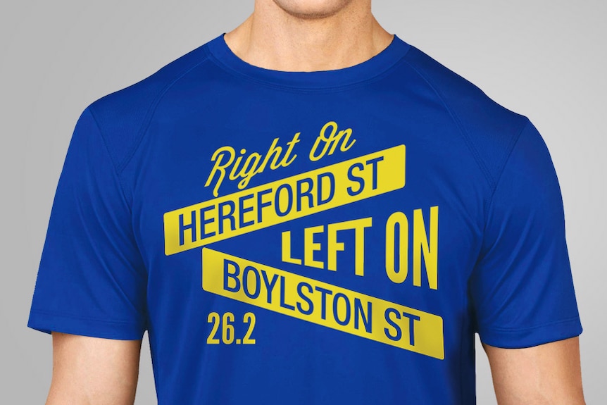 A blue t-shirt with "Right on Hereford Street, Left on Boylston Street" written on it in yellow.