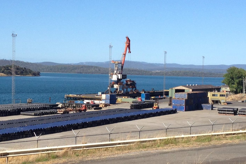 Port facilities with water in the background