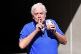 Clive Palmer leaves court with a sweet drink