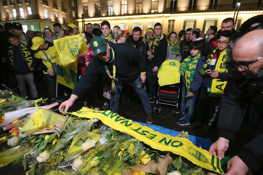 Supporters gather in Nantes to pay tribute to soccer player Emiliano Sala
