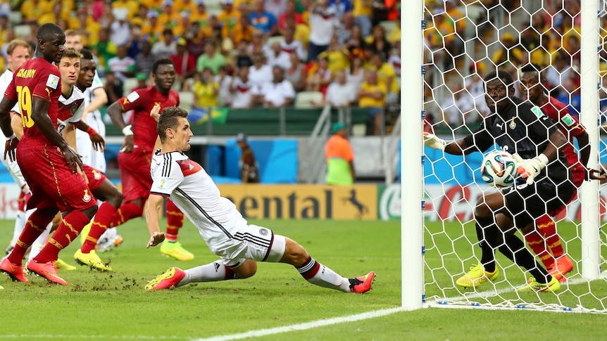 Germany's Miroslav Klose scores against Ghana in Fortaleza on June 21, 2014.