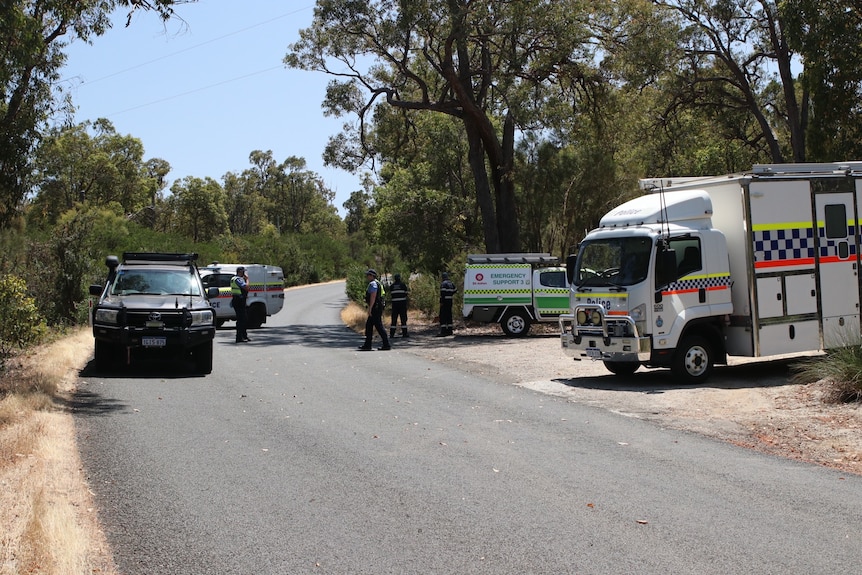 Police cordon off a road near bushlad