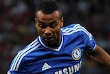 Manchester United's Wayne Rooney takes on Chelsea defender Ashley Cole