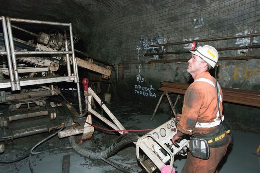 Miner working underground
