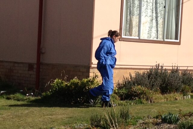 Police search a property at Oberon, in NSW's central west, where a three-year-old was found unconscious.