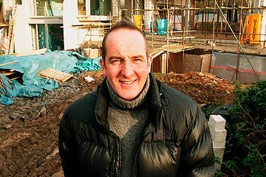 Grand Designs host Kevin McCloud on a construction site.