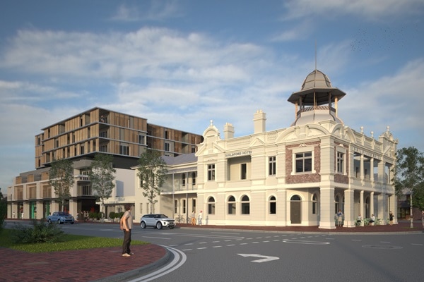 Guildford hotel restoration with apartment block at rear - artists impression
