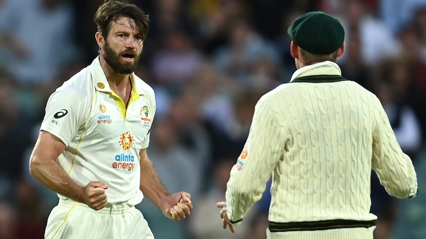 Michael Neser pumps both fists after taking a wicket