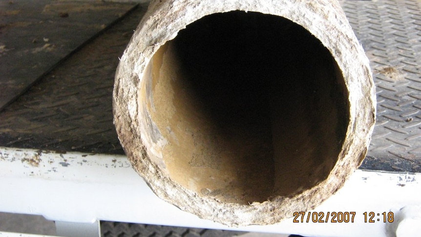 An asbestos cement water main pipe.