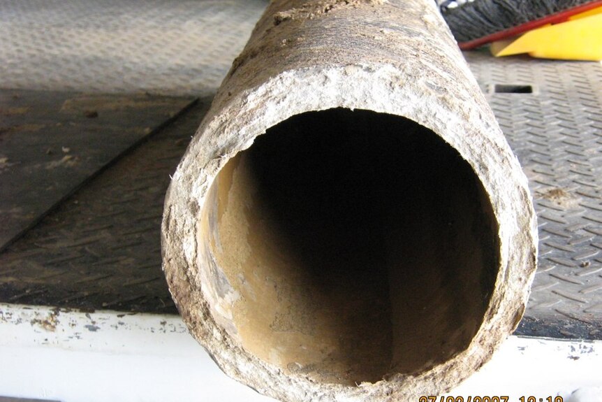 An asbestos cement water main pipe.