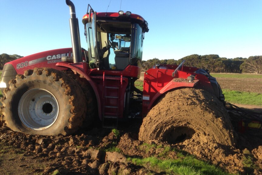 Bogged tractor used as a metaphor for poor mental health.