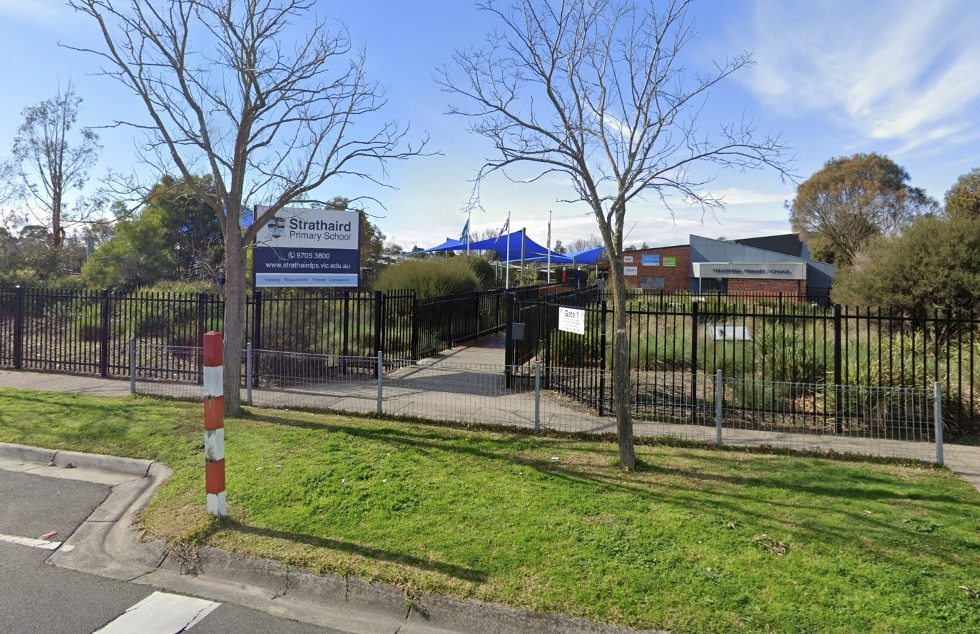 Brothers accused of killing stepfather outside primary school face court