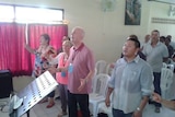 Andrew Chan in prayer group