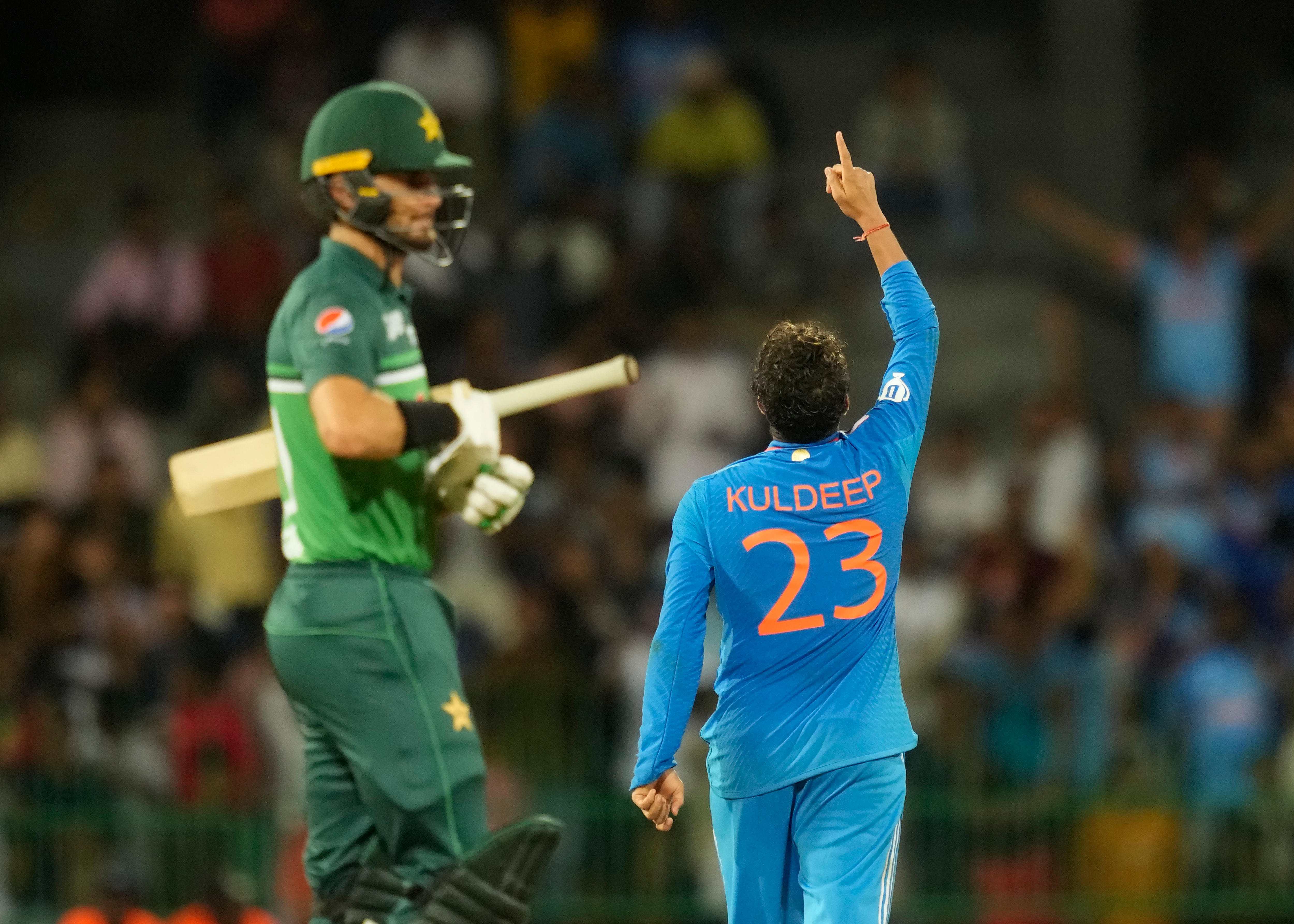 Kuldeep Yadav points to the sky