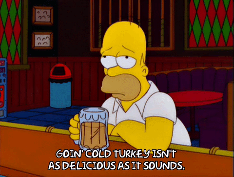 Homer Simpson at a bar drinking beer talking about going 'cold turkey'.