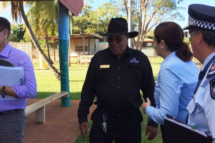 Aurukun Mayor Dereck Walpo (centre) meets Premier Annastacia Palaszczuk and Police Commissioner Ian Stewart