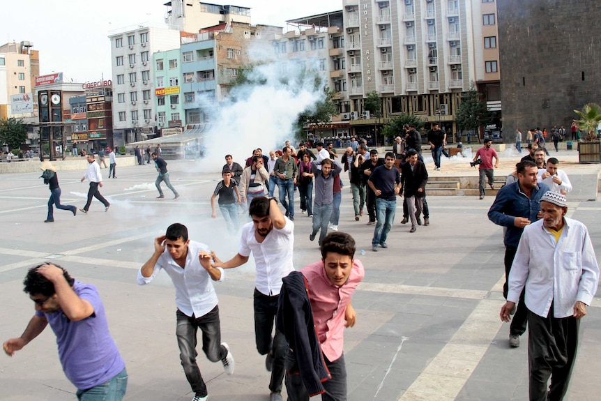 Riot police use tear gas to disperse demonstrators in Turkey