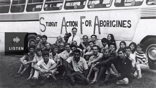 A black and white photo of the Freedom Riders and their bus in 1965. Has Audio.