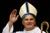 Archbishop of St Andrews and Edinburgh Keith O'Brien waves after mass at St Mary's Cathedral in Edinburgh.