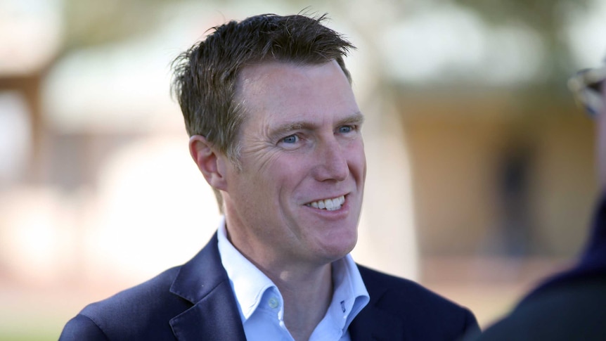 A head and shoulder shot of a smiling Christian Porter.