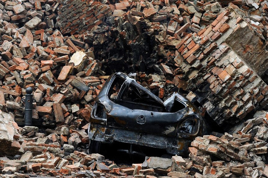 Car crushed in Italy earthquake