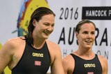 Cate Campbell smiles with sister Bronte Campbell at Australian Swimming Championships in Adelaide.