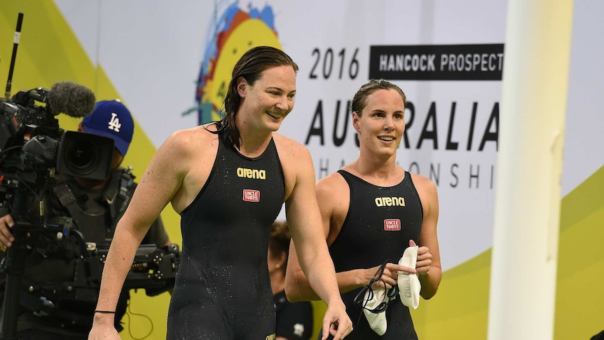 Cate Campbell smiles with sister Bronte Campbell at Australian Swimming Championships in Adelaide.