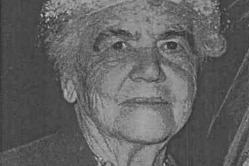 A black and white photo of an elderly woman 