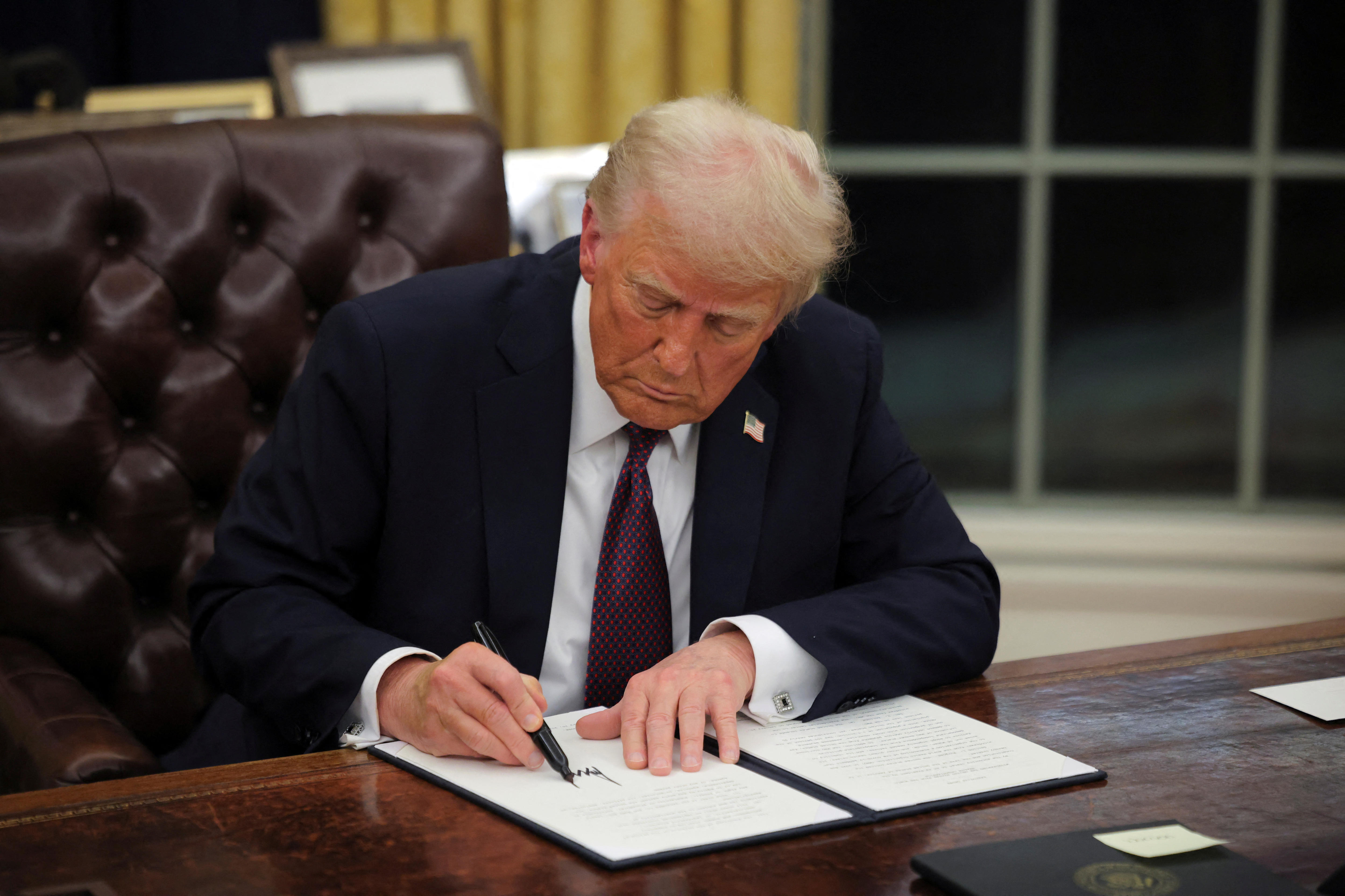 Here are all the changes Donald Trump signed off on during his first day as  US president - ABC News