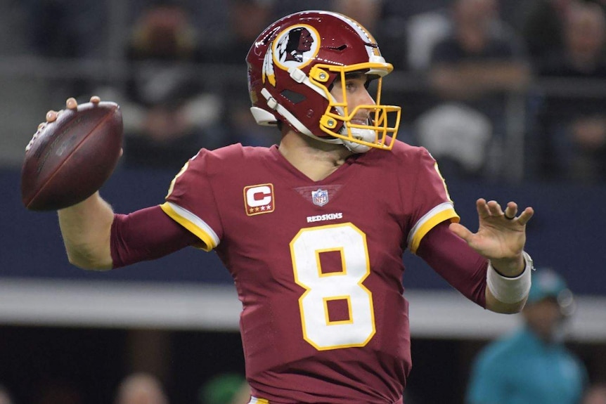 The Washington Redskins logo can be seen on their team helmet.