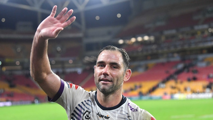 Melbourne Storm captain Cameron Smith waves as he leaves the Suncorp Stadium turf after an NRL game against Brisbane Broncos.