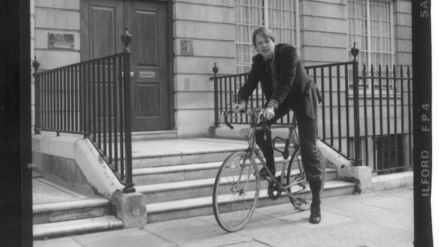 Mark Colvin on a bicycle in London