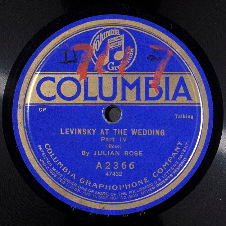 A blue record label with the word 'Columbia' in large letters then "Levinsky at the Wedding Part IV - Julian Rose".