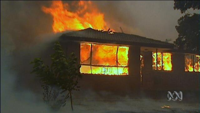 House engulfed in flames