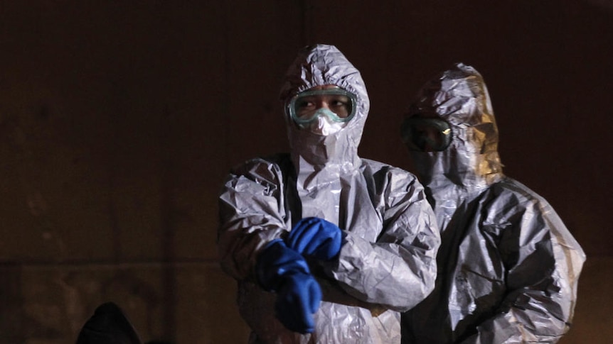 Officials guard against radiation near Fukushima Daini nuclear plant (Kim Kyung-Hoon: Reuters)