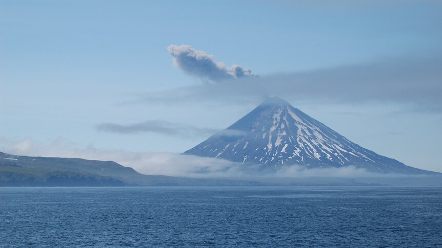 Mount Cleveland erupting ash. Alaska, Aleutian Islands, Kagamil Island.